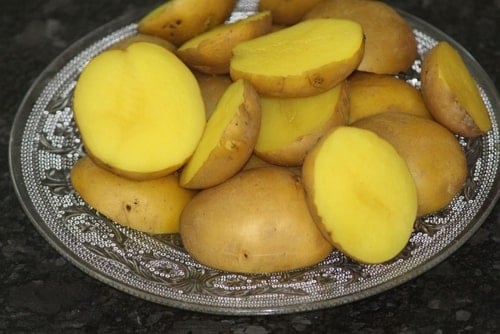 food that start with y Yukon gold potatoes laid out in a dish.