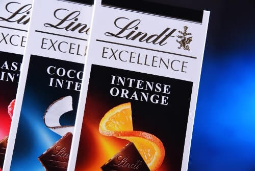 Lindt Swiss Chocolate brand samples displayed on a blue background.